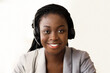 © Prostock-studio - Customer service operator. Portrait of smiling black female call center representative in headset, closeup