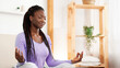© Prostock-studio - Meditation. Peaceful African American Woman Meditating Sitting In Lotus Yoga Pose In Bed Relaxing At Home. Selective Focus