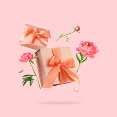 Poster - Gift boxes and peony flowers in air on pink background