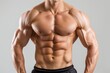 © Ben - Close-up of a muscular male torso showcasing defined abs and strong upper body, emphasizing bodybuilding, strength, and fitness dedication.