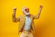 © alphaspirit - Overjoyed stylish senior man dancing and having fun