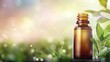 © Space Priest - A bottle of essential oil is sitting on a table next to some green leaves