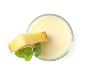 Poster - Tasty pineapple smoothie with slice of fresh fruit and mint in glass isolated on white, top view