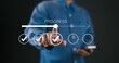 © Nirusmee - Businessman touches a digital progress checklist with check marks and an advancing loading bar, symbolizing task completion and project progress. progress bar, Management and tracking strategies,