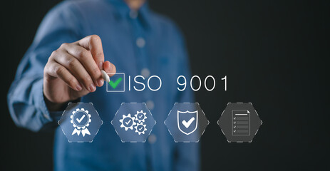 Leinwandbilder - Person touching ISO 9001 icon for quality management of organizations. ISO 9001 standard certification standardisation quality control concept.