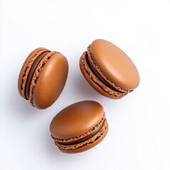 Wall Mural - Isolated chocolate macarons on a clean white background, simple and classic presentation.