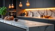 © kardaska - Modern kitchen with marble island and pendant lighting