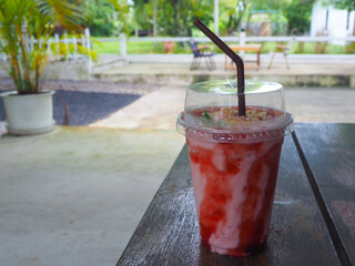 Delicious strawberry yogurt smoothies at a garden cafe