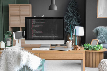 Canvas Print - Interior of office with programmer's workplace decorated for Christmas