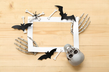 Sticker - Composition with paper picture frame and decorations for Halloween on wooden background