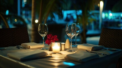 Canvas Print - A romantic dining setup with candles and flowers, creating an intimate atmosphere.