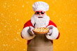 © deagreez - Photo of cheerful santa claus chef headwear grandpa grey beard hold fresh sweet big pie jam filler wear red x-mas costume gloves sun specs cap apron isolated yellow color background