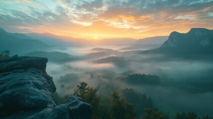 hazy panorama of the landscape. Wonderfully surreal dawn on rugged peaks, offering a glimpse of the foggy valley beneath. cloud cover above the forest. A view of the fanciful countryside below. 