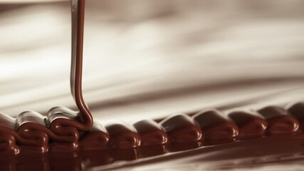 Poster - Super Slow Motion of Pouring Hot Melted Chocolate, Creating Waves Shapes, Filmed on High Speed Cinema Camera, 1000 fps. Camera in Motion. Extreme Macro Shot.