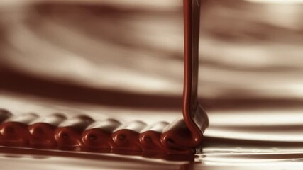 Poster - Super Slow Motion of Pouring Hot Melted Chocolate, Creating Waves Shapes, Filmed on High Speed Cinema Camera, 1000 fps. Camera in Motion. Extreme Macro Shot. Speed Ramp Effect.
