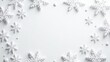 © Aksana - White background with decorative snowflakes placed around the frame, copy space in the centerConcept: winter background, snowflakes design, Christmas decoration, festive border, seasonal frame