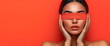 © Vasiliy - Woman with red blindfold against vibrant background. Beauty and fashion concepts. Banner with copy space