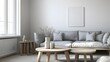© STGZ. - Scandinavian-style living room with a simple gray sofa and light wooden table
