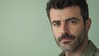 © Lifestyle Images - A man with a mustache and gray hair is looking at the camera