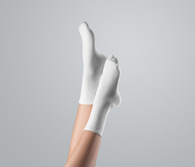 Sticker - Template of white high socks on women's foot, with stretched toes, legs up presentation, side view, isolated on background.