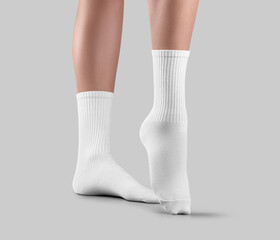 Sticker - Template of white high gaiters on women's legs, one foot with stretched toes, side view, for design, branding.