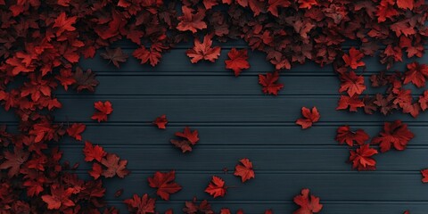 Poster - Red autumn leaves on a dark wooden background.