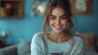© julija - smiling young latin woman engrossed in her smartphone joyfully shopping online and engaging with trendy apps the vibrant blue background highlights her excitement and modern lifestyle
