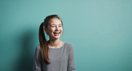 Wall Mural - Laughing young Caucasian girl with ponytail wearing sundress on plain purple background