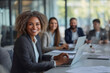 © jroballo - African American businesswoman having a business meeting with her team. generative ai image.