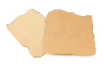 Sticker - Pieces of old paper with dark burnt borders isolated on white