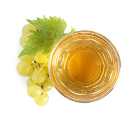 Wall Mural - Ripe grapes and glass of tasty juice isolated on white, top view