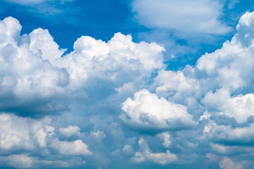 White heap clouds in the blue sky..