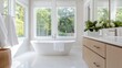 © MarkFinal - A bright, modern bathroom featuring a freestanding tub, large windows, and minimalistic decor with natural elements.
