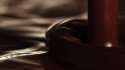 Poster - Super Slow Motion of Pouring Hot Melted Chocolate in Line. Filmed on High Speed Cinema Camera, 1000 fps. Camera in Motion. Extreme Macro Shot.