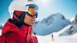 © Jafree - Close up of African American Female Skier in Bright Red Jacket and White Helmet in Snowy Mountain Landscape. Concept of Winter Sports, Skiing Adventure, and Outdoor Enthusiasm. Copy space