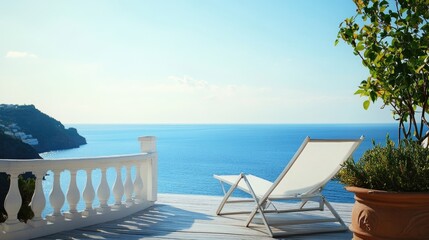 White deck chair on terrace with stunning sea view Mediterranean hotel under blue sky on sunny day, summer vacation concept