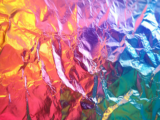 Wall Mural - A colorful piece of foil with a rainbow pattern