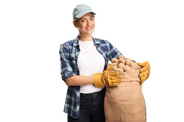 Poster - Young female farmer holding potatoes in a sack