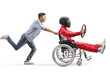 © Ljupco Smokovski - Guy pushing a car racer with helmet in a wheelchair holding a steering wheel