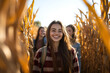 © MonkaLemonka - portrait of a teen girl having fun with friends in autumn corn maze