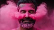 ©  Shomixer - A joyous man stands enveloped in a cloud of vivid pink powder with a peaceful expression, capturing the spirit and vibrant celebration of a colorful cultural festival.