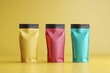© volga - Colorful packaging pouches on yellow background