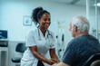 © Immersive Dimension - Caring Black Female Nurse Attending to Elderly Male Patient, Nurse Woman Interaction With Patient