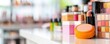 © Kanin - Cosmetics and beauty products arranged on a modern, bright vanity countertop.