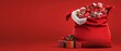 © Nathamanee - A red bag with a white santa hat on it is filled with many presents