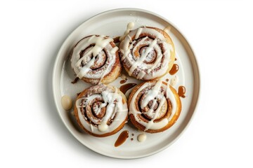 Wall Mural - white cream cinnamon rolls on a white plate isolated on white, top view, overhead view, cut-out, PNG, clipping path. MZ 