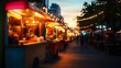 © kwangze - Vibrant street food market at dusk, with illuminated stalls and a lively atmosphere, showcasing various delicious cuisines in a bustling urban setting.
