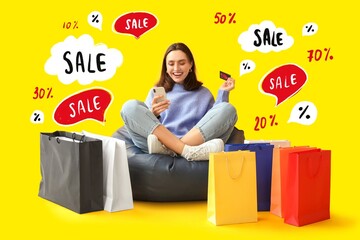 Wall Mural - Young woman with credit card, mobile phone and shopping bags on yellow background. Black Friday sale