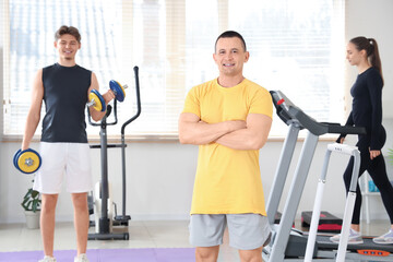 Poster - Portrait of male coach in gym