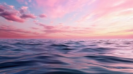Aufkleber - A beautiful ocean with a pink sky in the background. The water is calm and the sky is filled with clouds